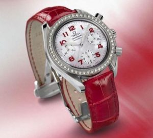 The white dials copy watches have red leather straps.